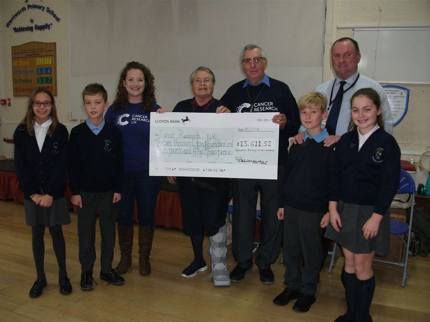 From left to reight, Imogen Sullivan, Louis Challis, (Lynette Farley, Friedle and Brian Porter – from Cancer Research) Zach Harris, Headteacher Paul Langridge and Ruby Warke. (5939199)