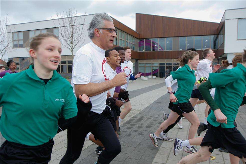 The Rev Steve Chalke amongst the runners finishing at the academy.