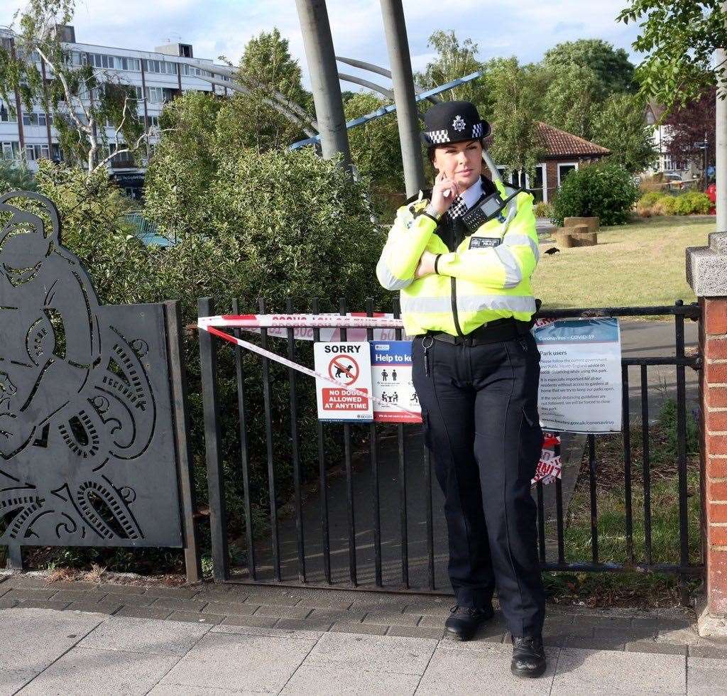 Police stand guard outside the scene in Crayford