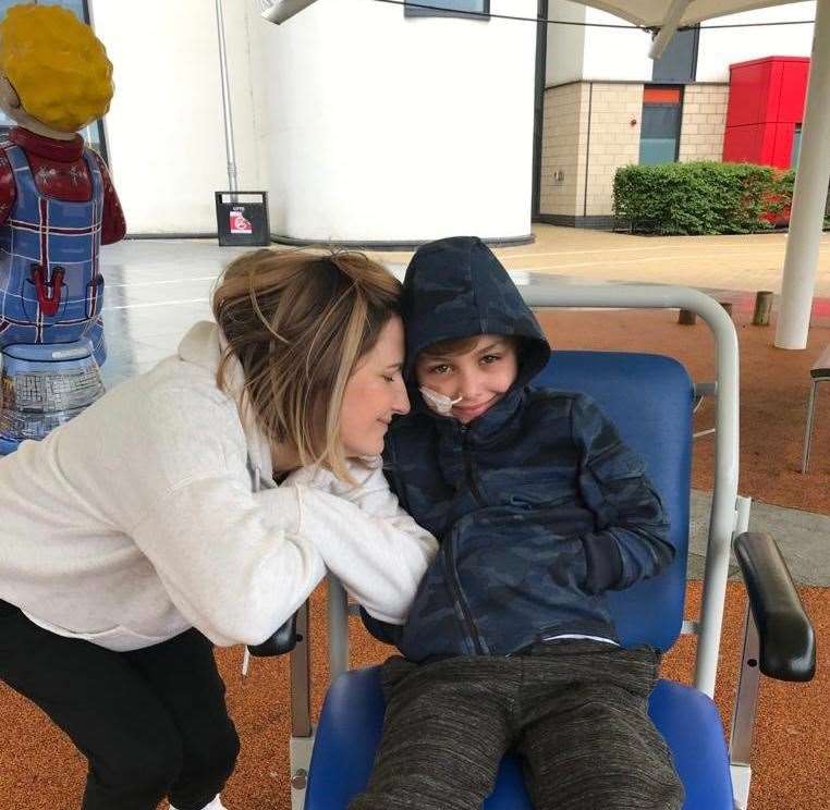 Leo, eight, and his mother Louise (family handout/PA)