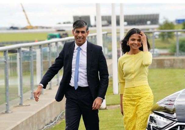 Rishi Sunak and wife Akshata Murty arrive for the launch of the Conservative Party General Election manifesto at Silverstone in Towcester, Northamptonshire Picture: James Manning/PA