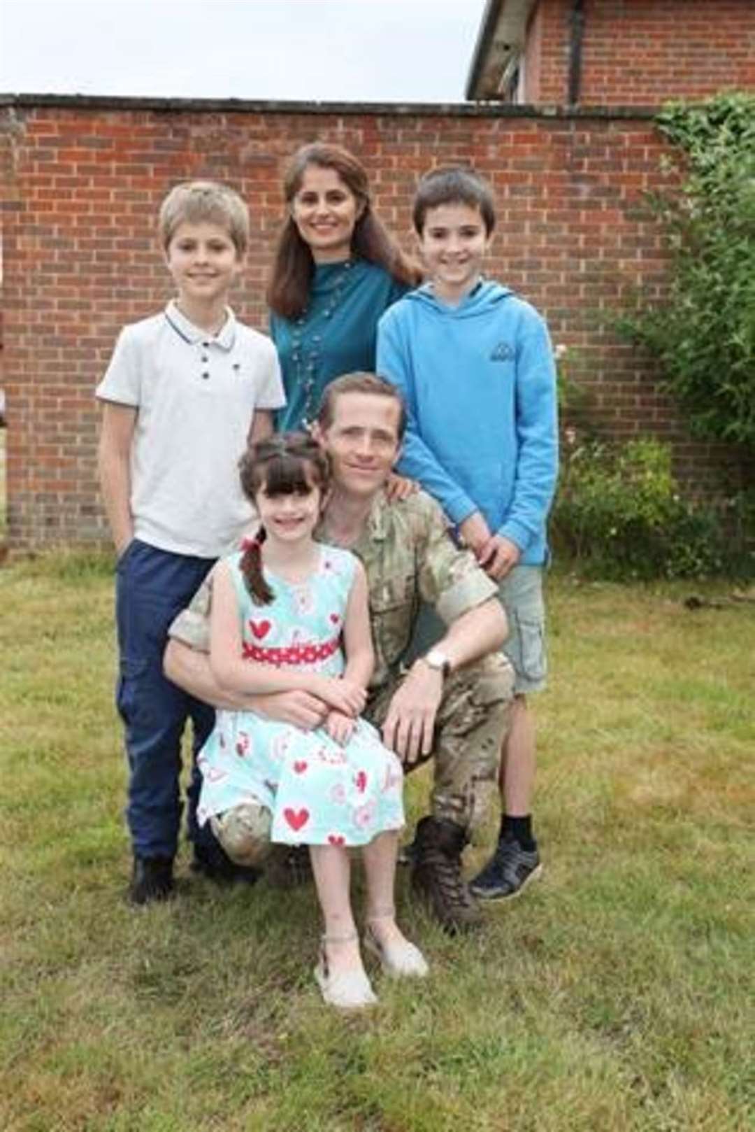 Major Brannigan and his family (Christopher Brannigan/PA)