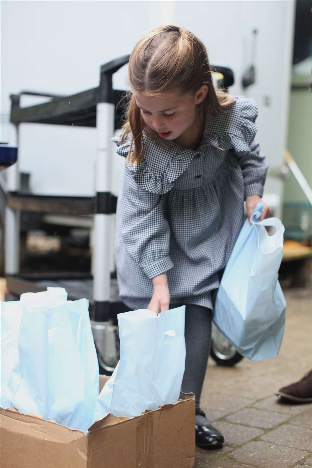 Princess Charlotte helped to deliver food packages for isolated pensioners (Duchess of Cambridge/Kensington Palace/PA)