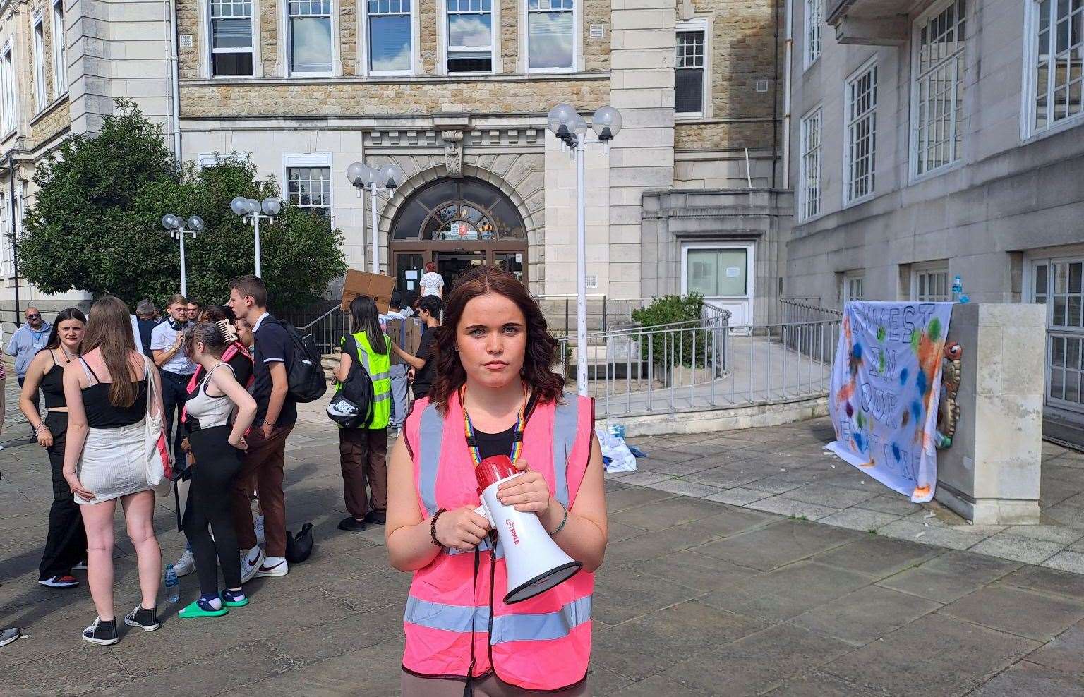 Members of GYG youth group protested against the cuts outside County Hall