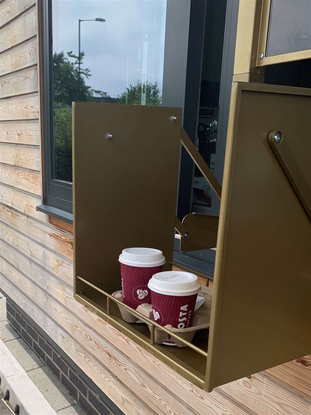 Costa has set-up drive-through hatches for customers to collect their items with no contact (Costa/PA)