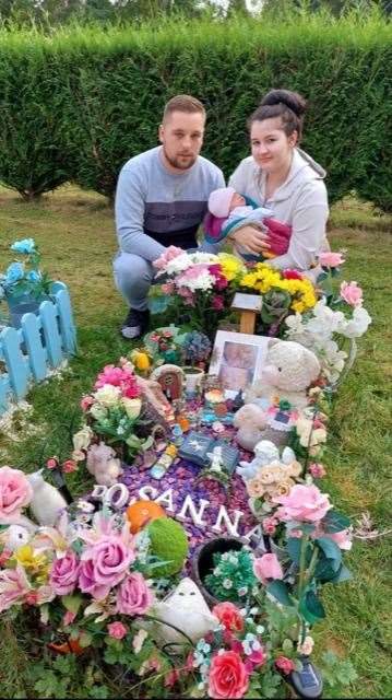 Maidstone couple David Matthews and Elena Sala with their daughter Lola at Rosanna's grave (58992861)