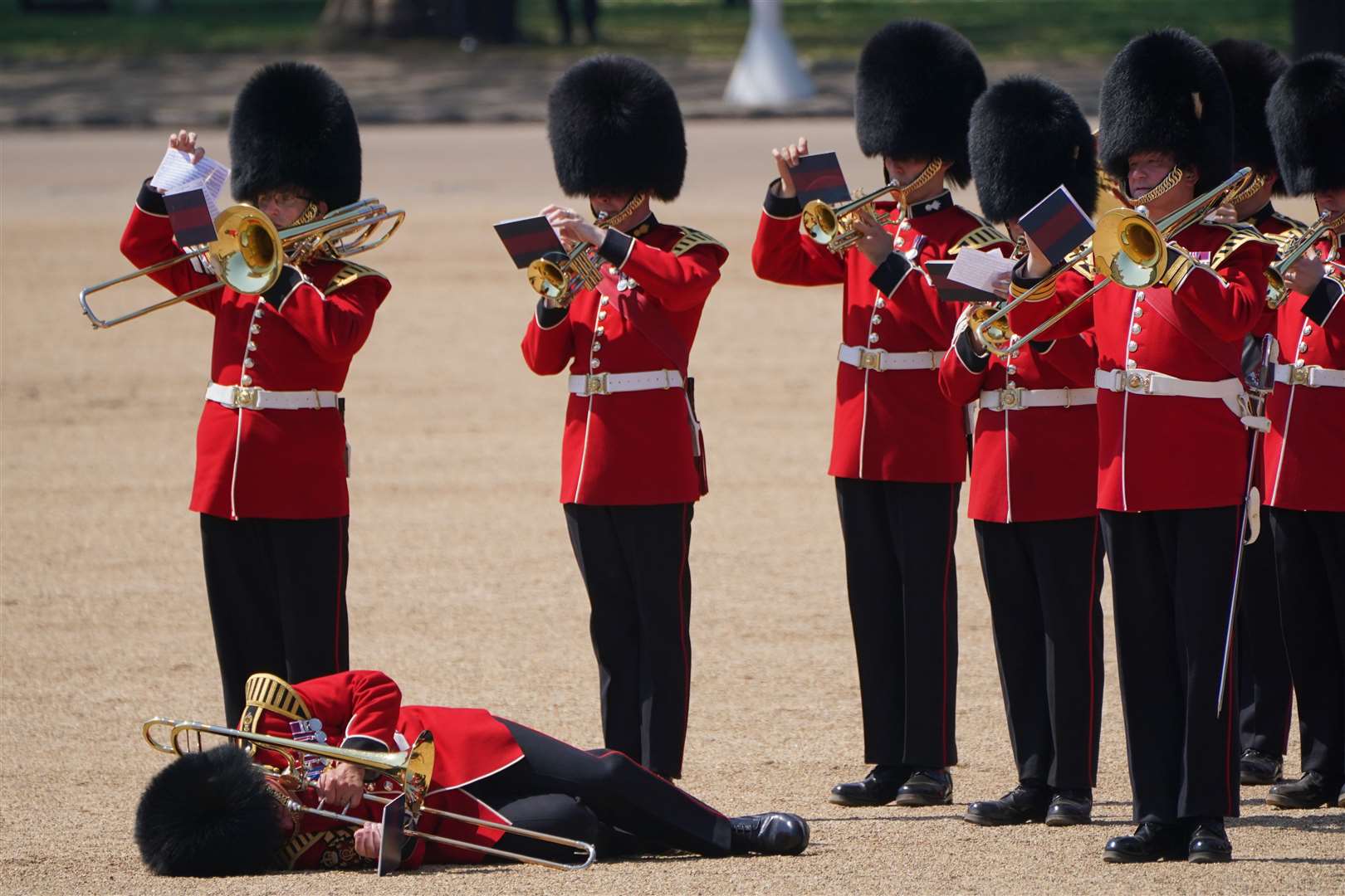 A trombone player in the military band faints during the Colonel’s Review for Trooping the Colour (Jonathan Brady/PA)