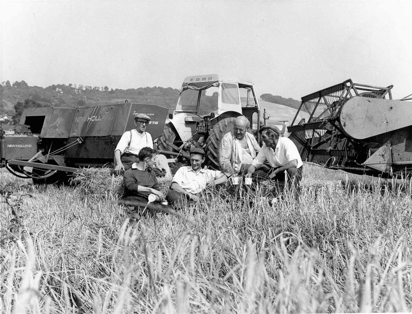 Time for a breather during harvesting at Hockets Farm, Detling, in 1971