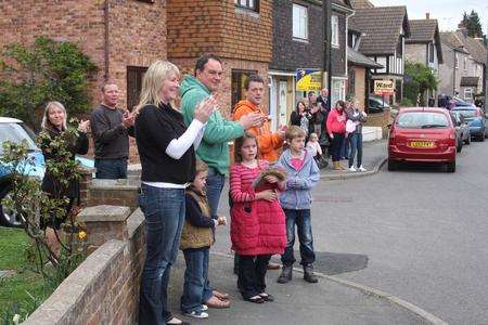 Villagers lined the streets