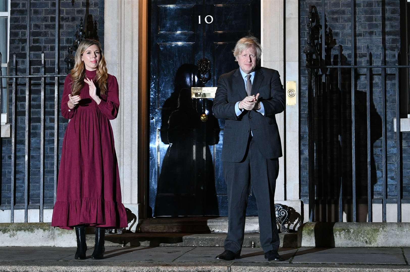 Prime Minister Boris Johnson and his partner Carrie Symonds paid tribute outside 10 Downing Street (Stefan Rousseau/PA)