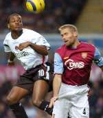 Darren Bent gets above Olof Mellberg. Picture: BARRY GOODWIN