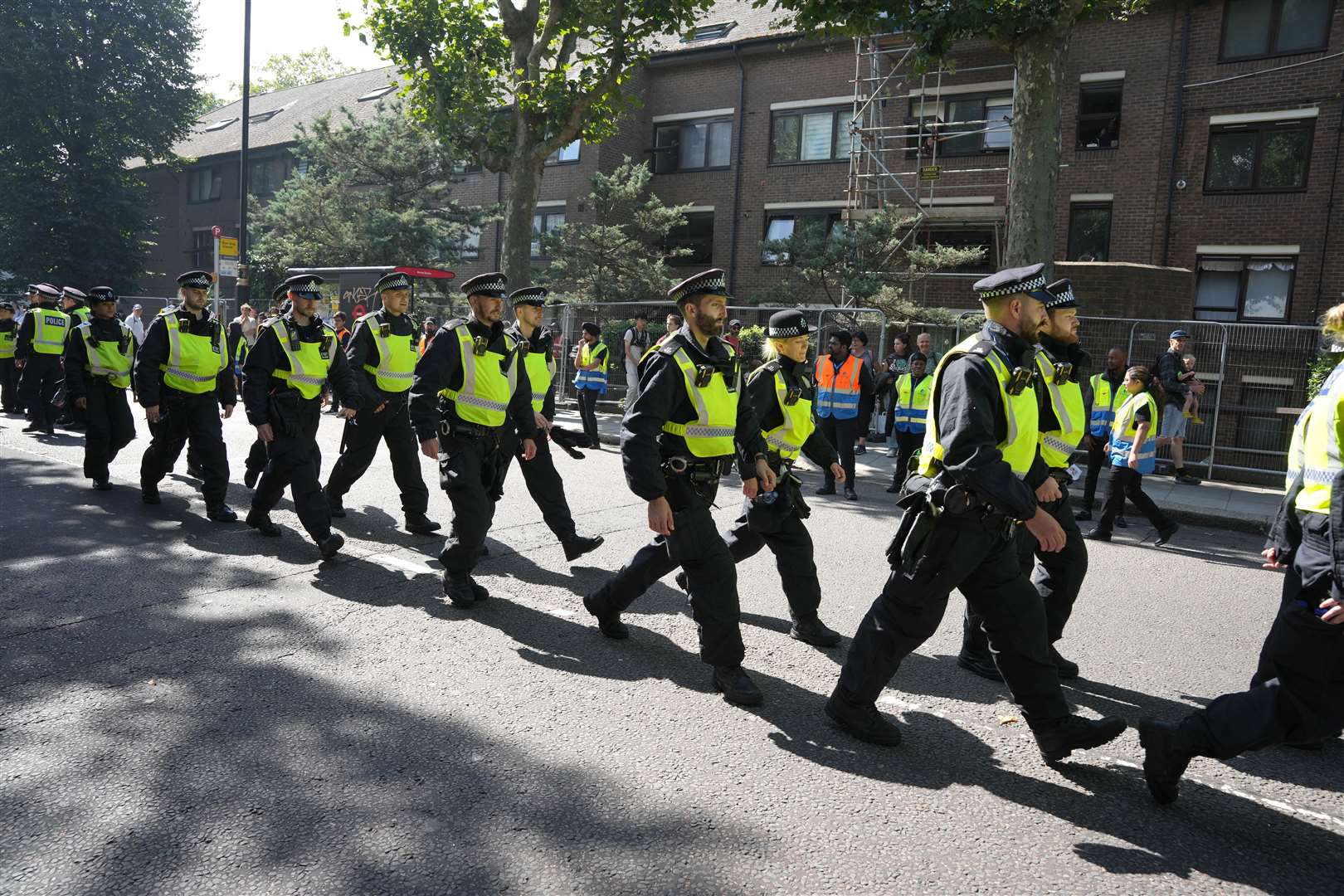 Police officers during the Children’s Day Parade on Sunday (Jeff Moore/PA)