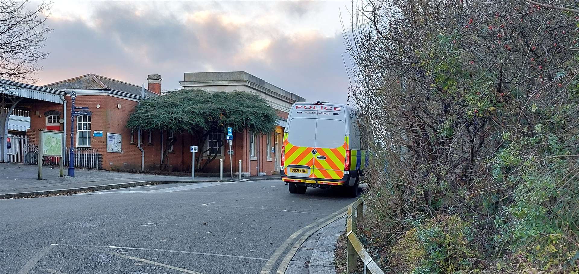 Police outside Whitstable train station after Modasher Hossain was stabbed