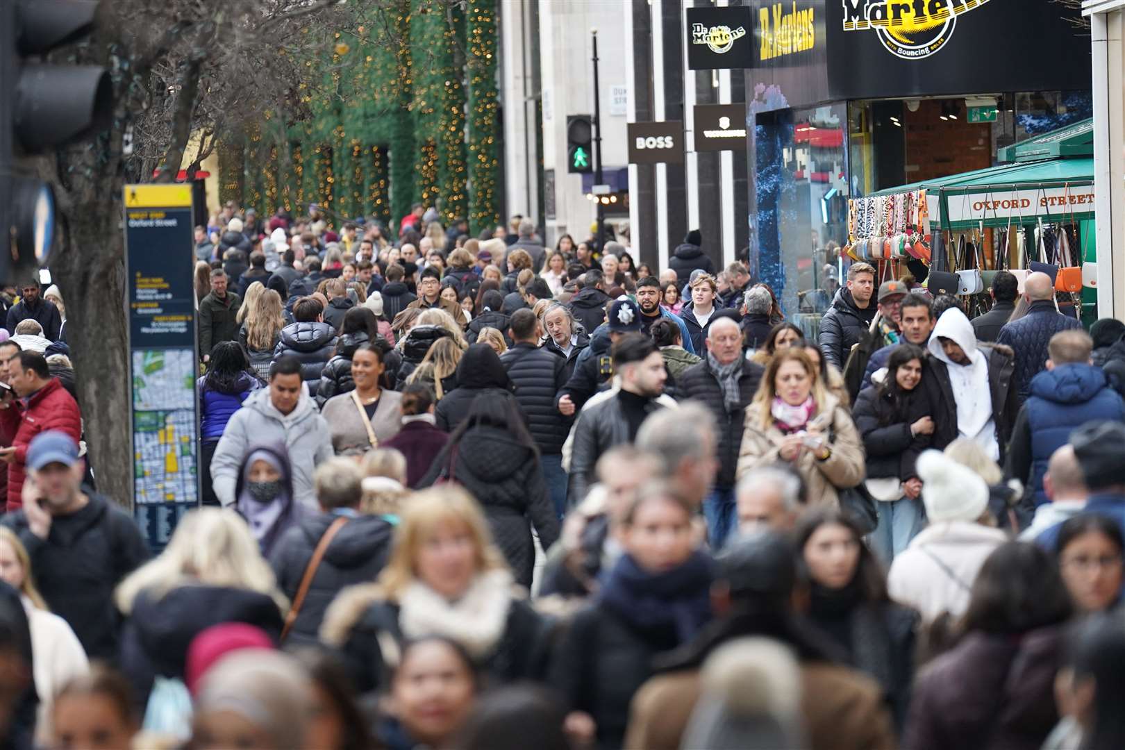 Industrial action by the Royal Mail may have meant more people hit the high street for their Christmas shopping (James Manning/PA)