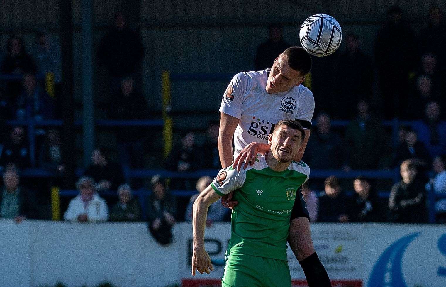 A Whites player wins a header. Picture: Stuart Brock