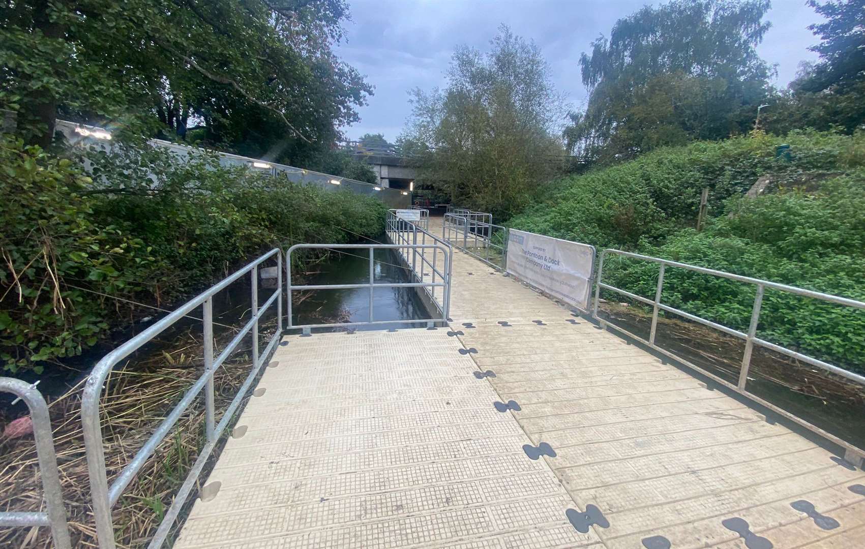 The pontoon allows contractors to access the bridge under the M20. Picture: National Highways