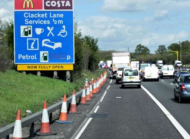 The manhole collapsed near Clacket Lane services. Stock image