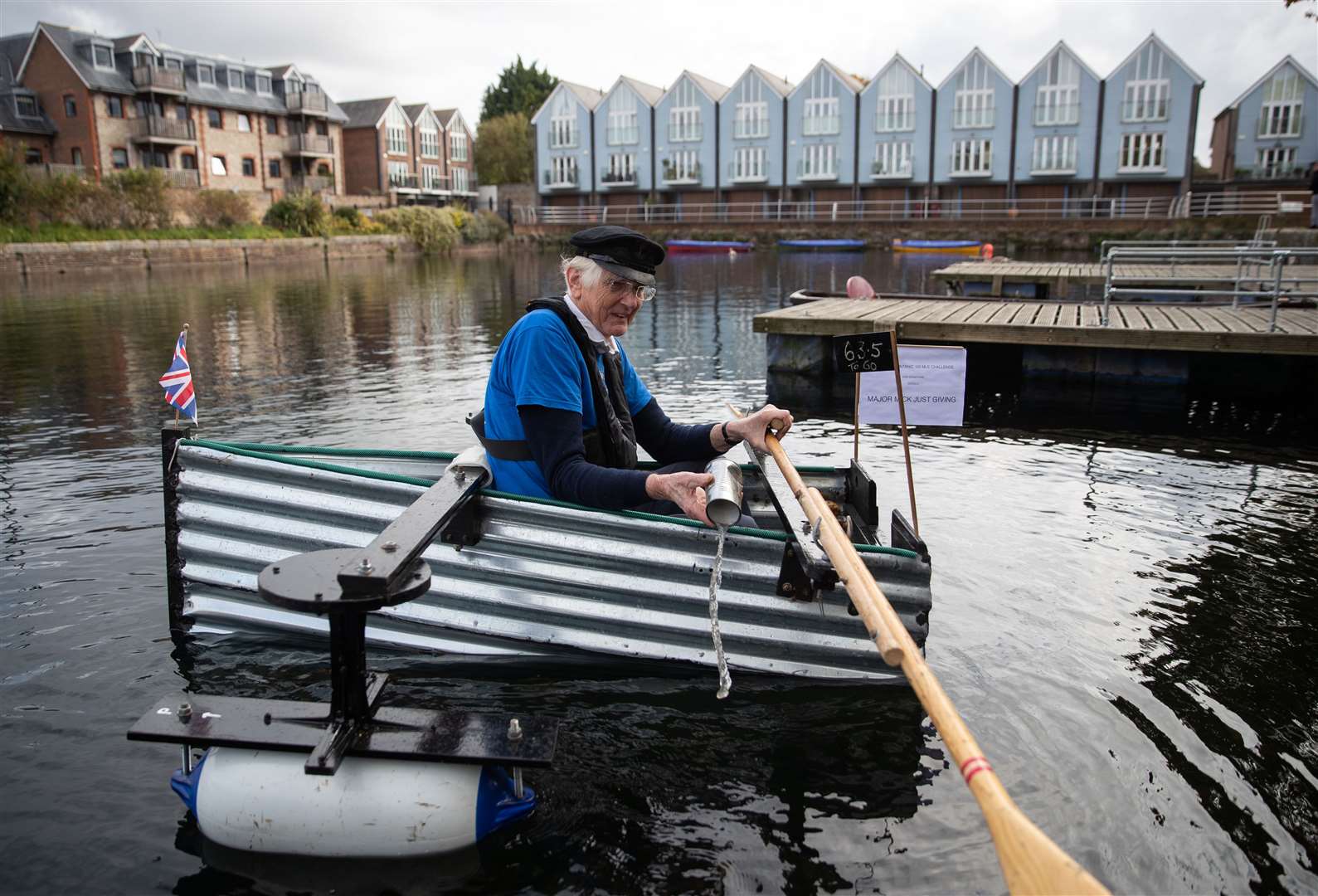 Major Mick bails out water during his journey (Andrew Matthews/PA)