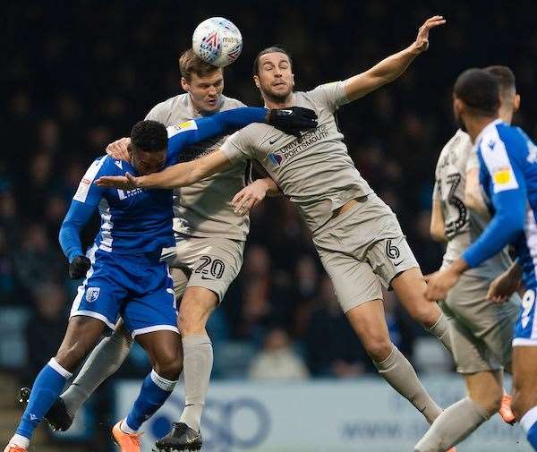 Sean Raggett up against the Gills while playing for Portsmouth in January