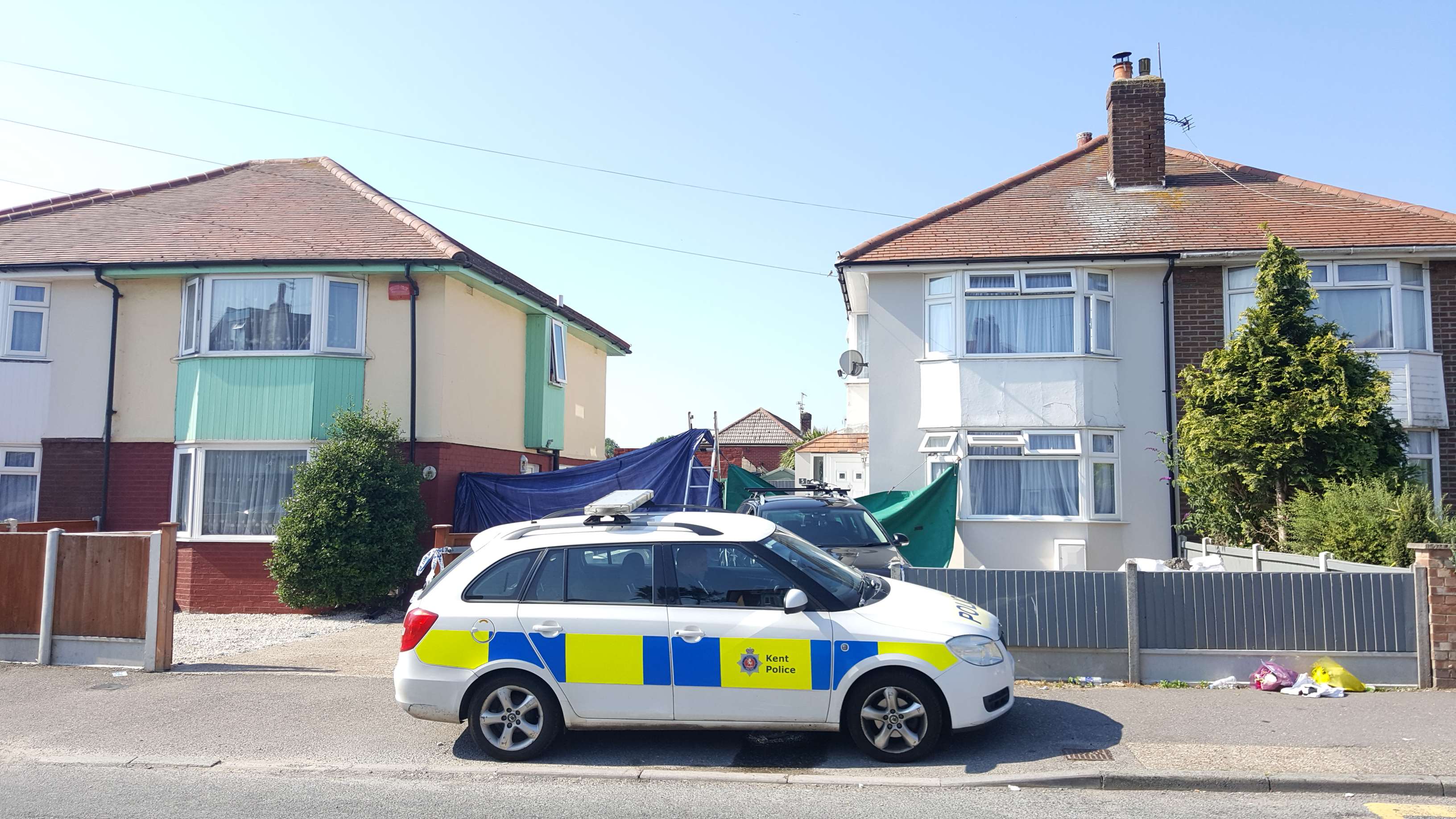 Tarpaulin was put up outside the house in Bush Avenue