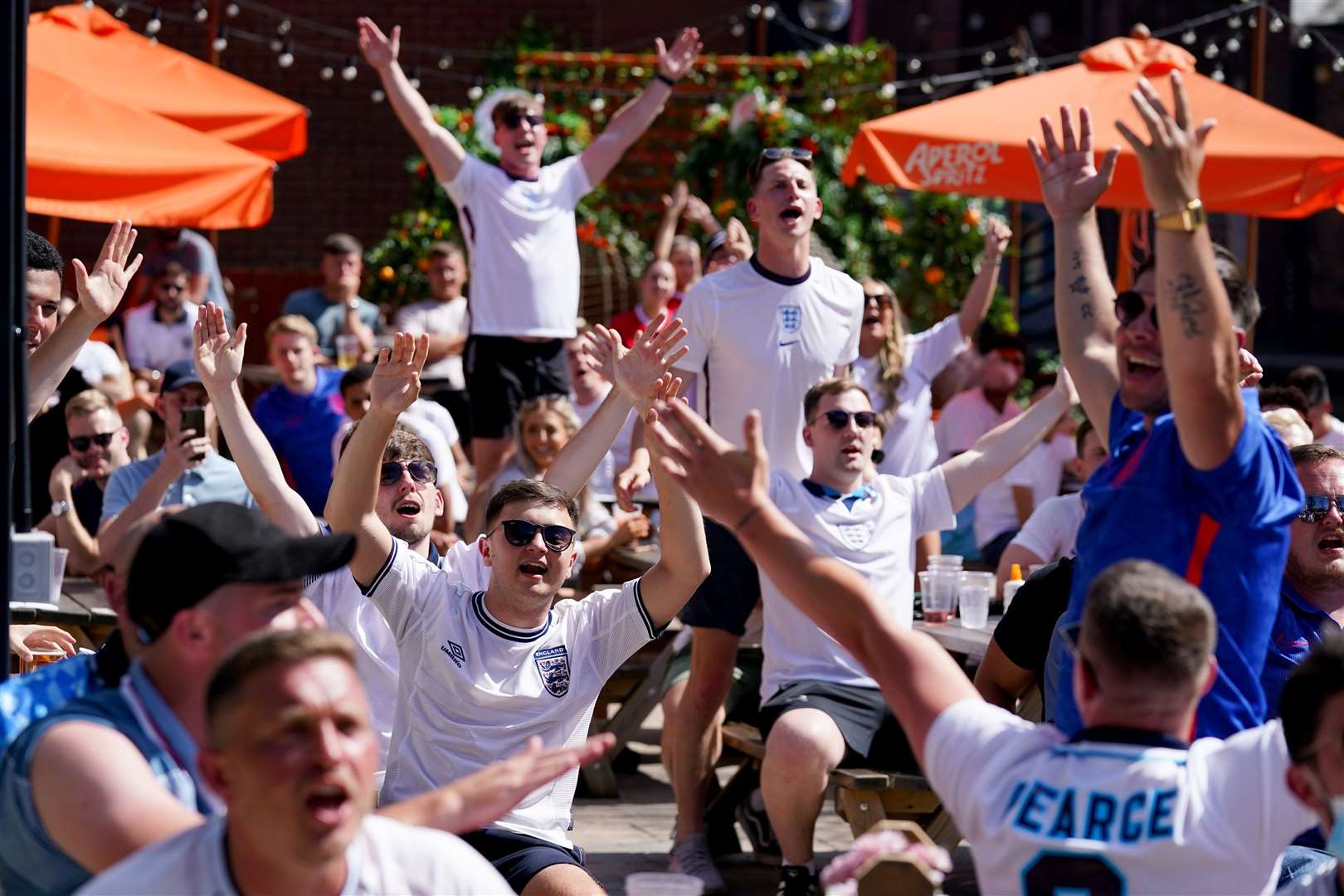 Fans celebrate victory after watching England v Croatia (Jacob King/PA)