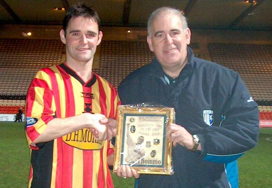 Alan Liptrott presents play-off hero Andy Thomson with a special hero award