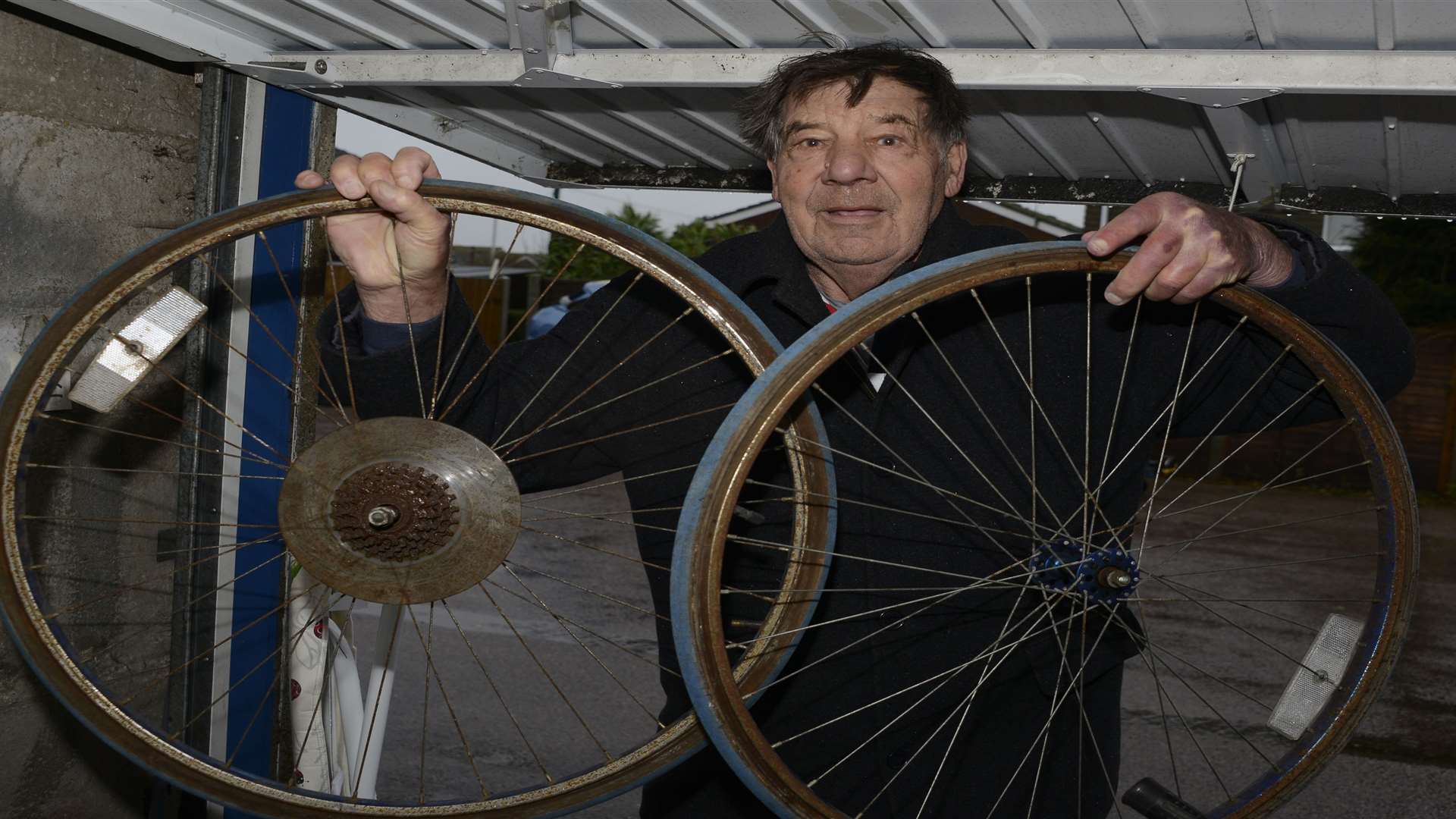 Michael Furness in his garage where he keeps the bikes he recycles