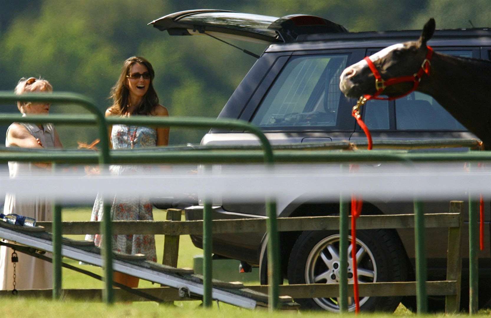 Kate watching William play polo in 2005 (Chris Ison/PA)