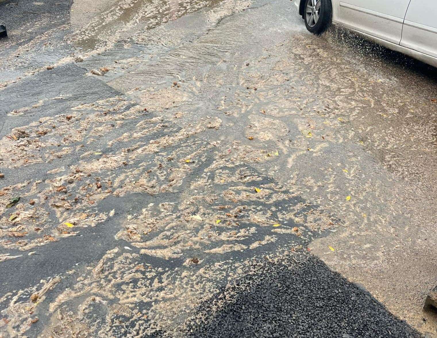 Sewage running through the streets at Whitstable Heights. Picture: Leigh Hawkins