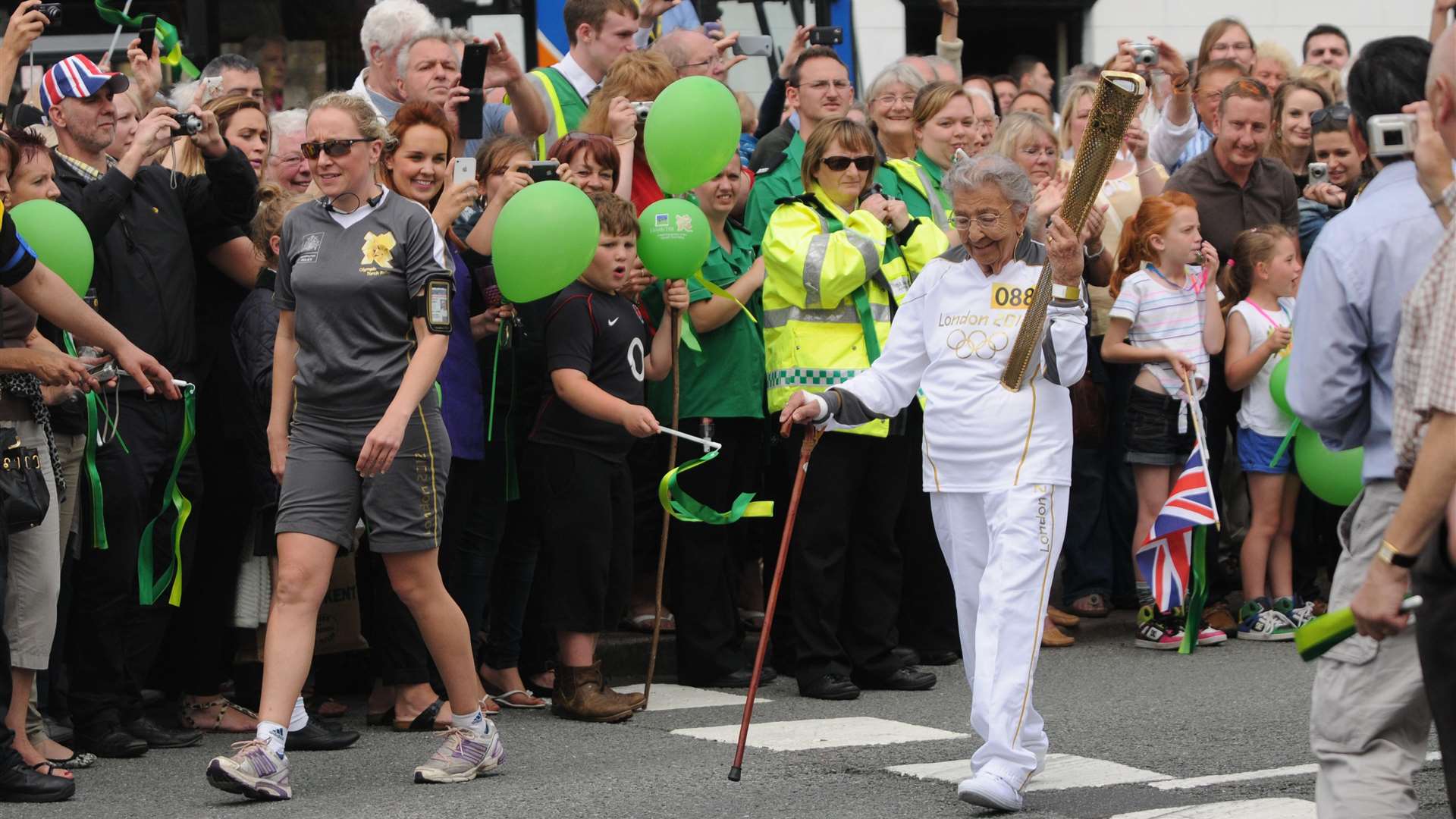 Paddy Rayner carried the Olympic Torch in front of cheering crowds in Birchington in 2012