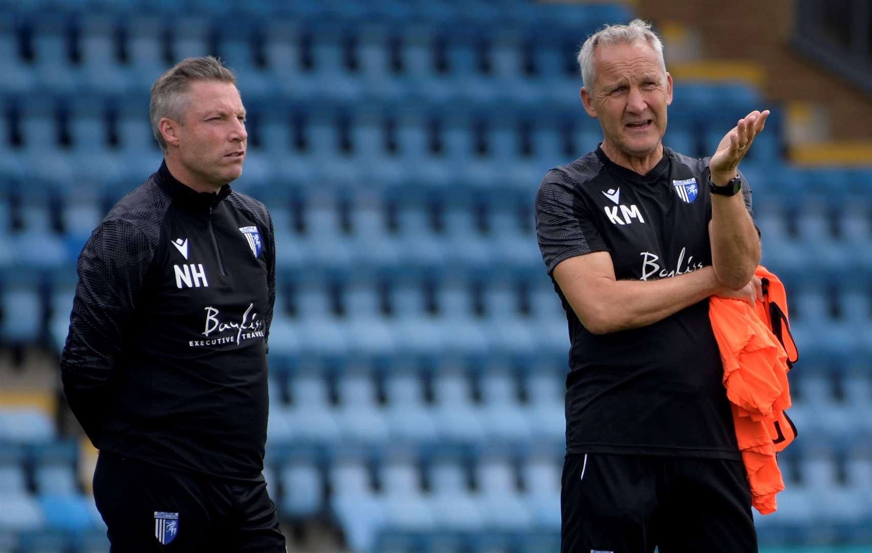 Departed manager Neil Harris with the new interim head coach Keith Millen prior to the start of the season Picture: Barry Goodwin