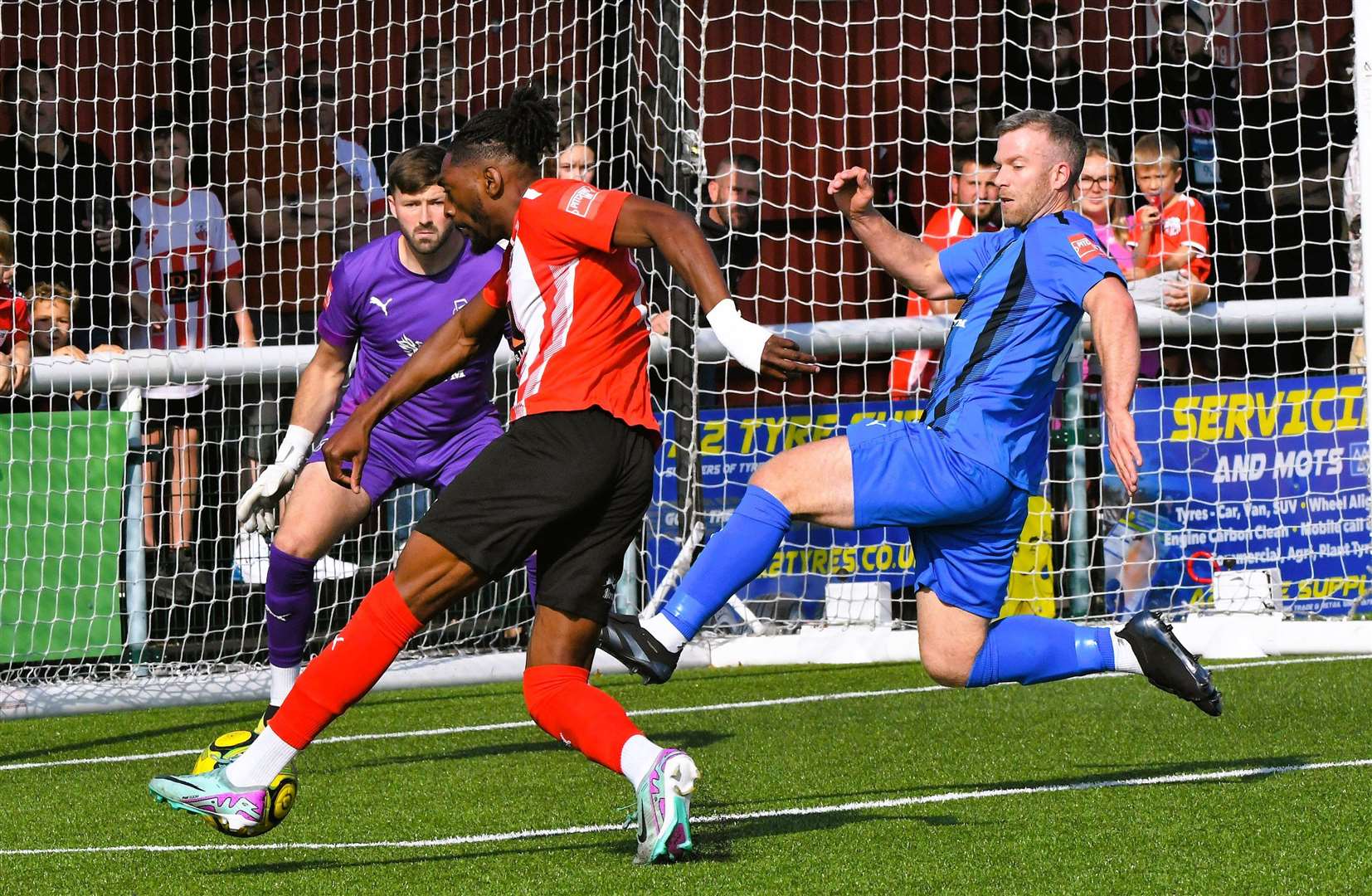 Sheppey's Gil Carvalho is thwarted by the away defence. Picture: Marc Richards