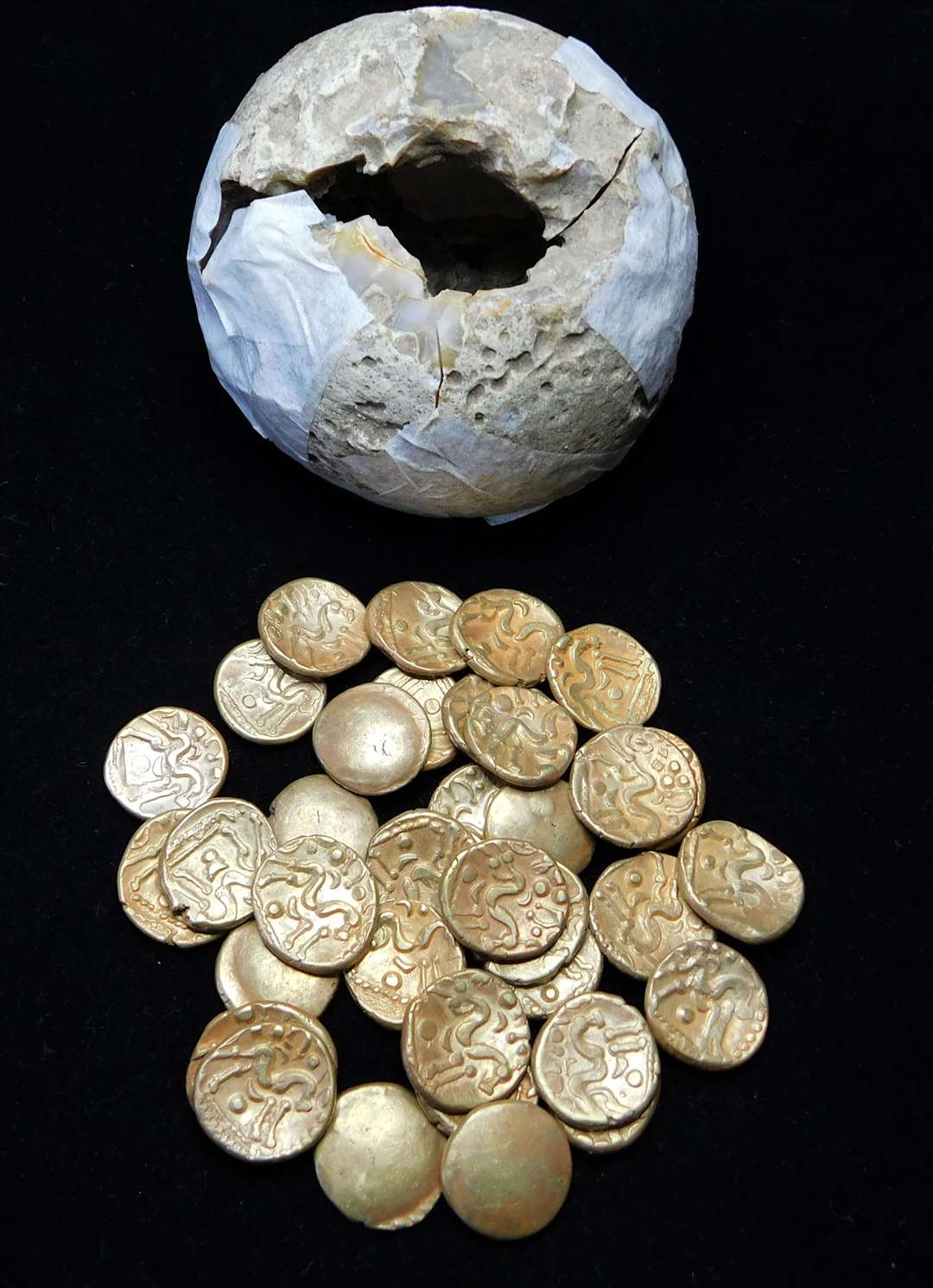 The Roman coins were concealed within a flint nodule. Picture: Tony Asquith