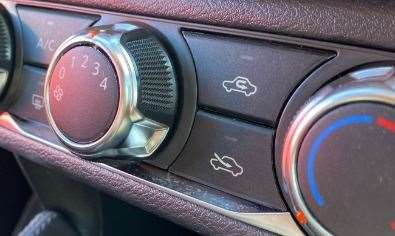 The recirculation button can help maintain the car's cool temperature in a heatwave
