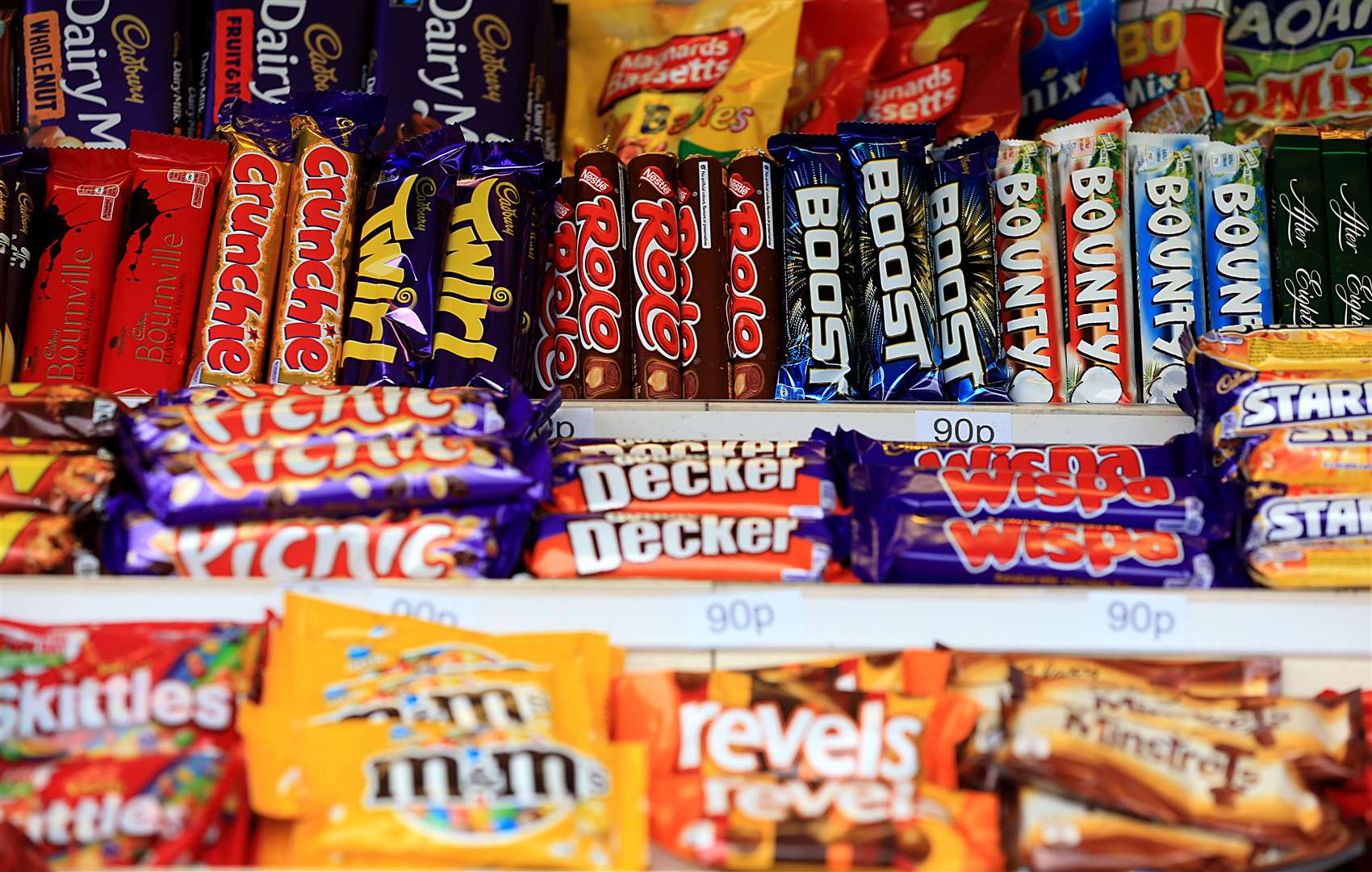 Promoting confectionery and other high-in-sugar foods at supermarket checkouts or store entrances will be banned under proposals in the obesity strategy (Mike Egerton/PA)