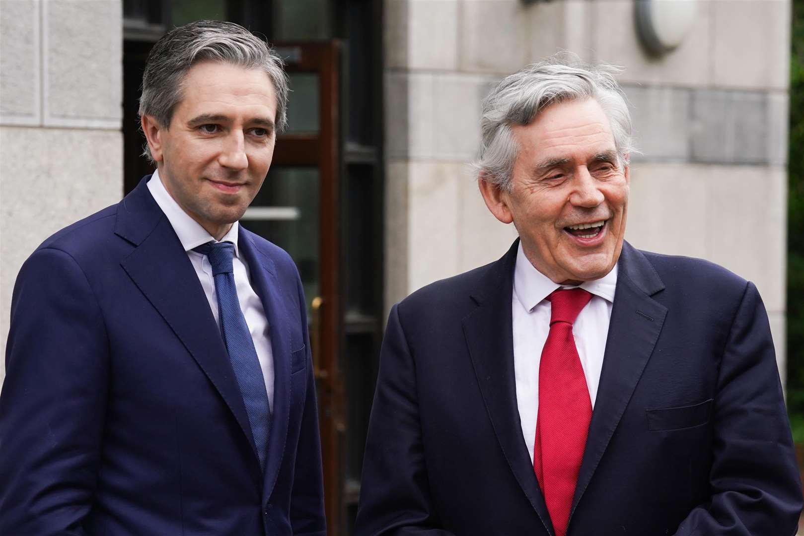 Simon Harris, left, with former UK prime minister Gordon Brown at the inaugural Child Poverty and Well-being Summit in Dublin on Thursday (Brian Lawless/PA)