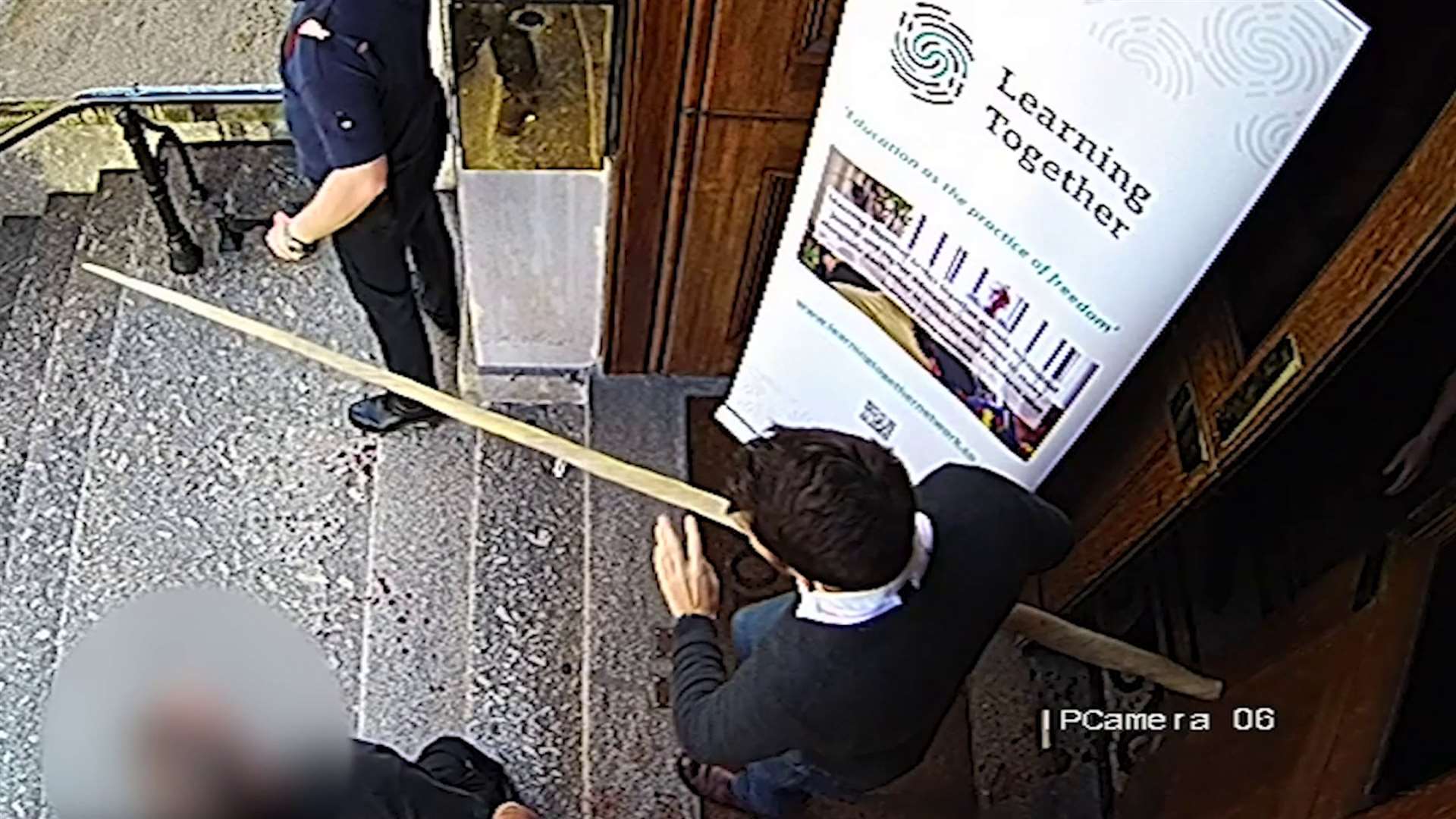 Learning Together delegate Darryn Frost carrying a narwhal tusk to chase Usman Khan from Fishmongers’ Hall (Metropolitan Police/PA)