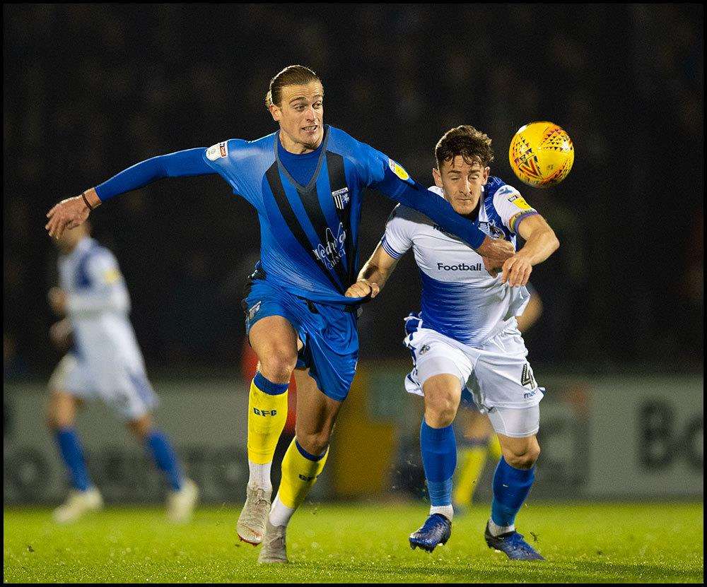Gillingham striker Tom Eaves battles for the ball Picture: Ady Kerry