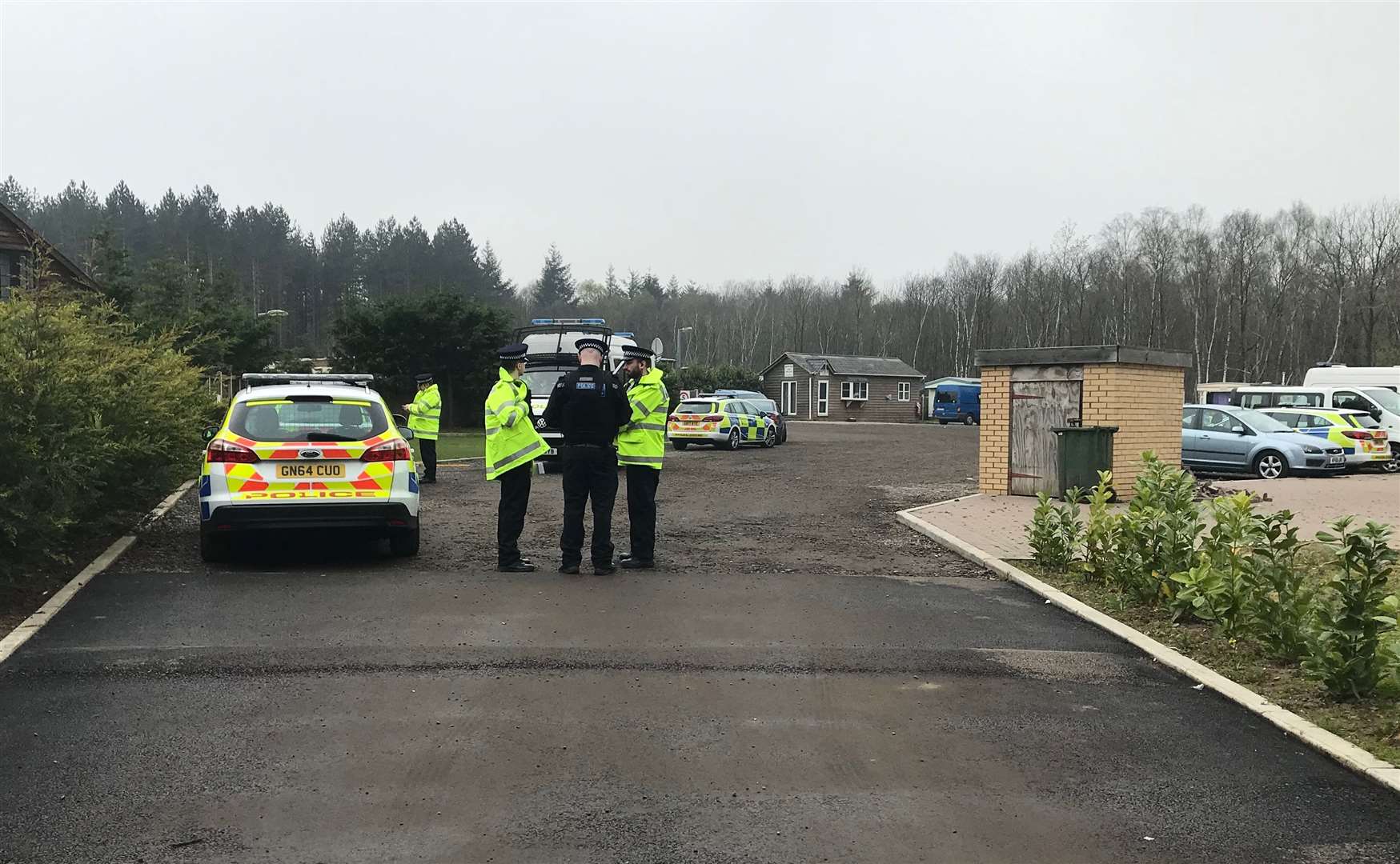 Police at the Brotherhood Wood caravan site on Monday morning