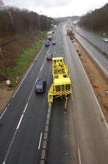 Quick Moveable Barrier Machine in action