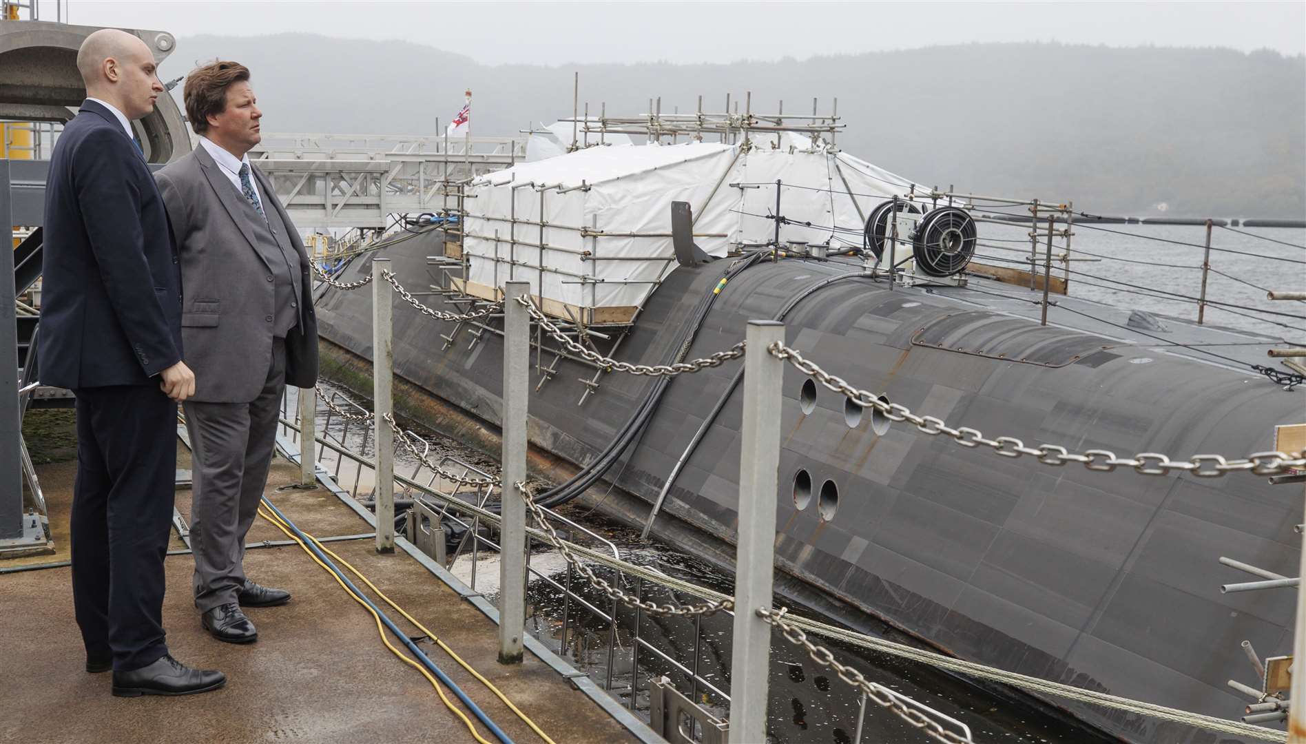 Defence procurement minister Alec Shelbrooke, right, during a visit to Faslane naval base (Steve Welsh/PA)