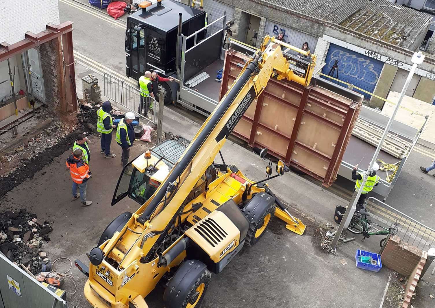 The Banksy in Park Place starts its journey away from its home. Picture: Laura Jones