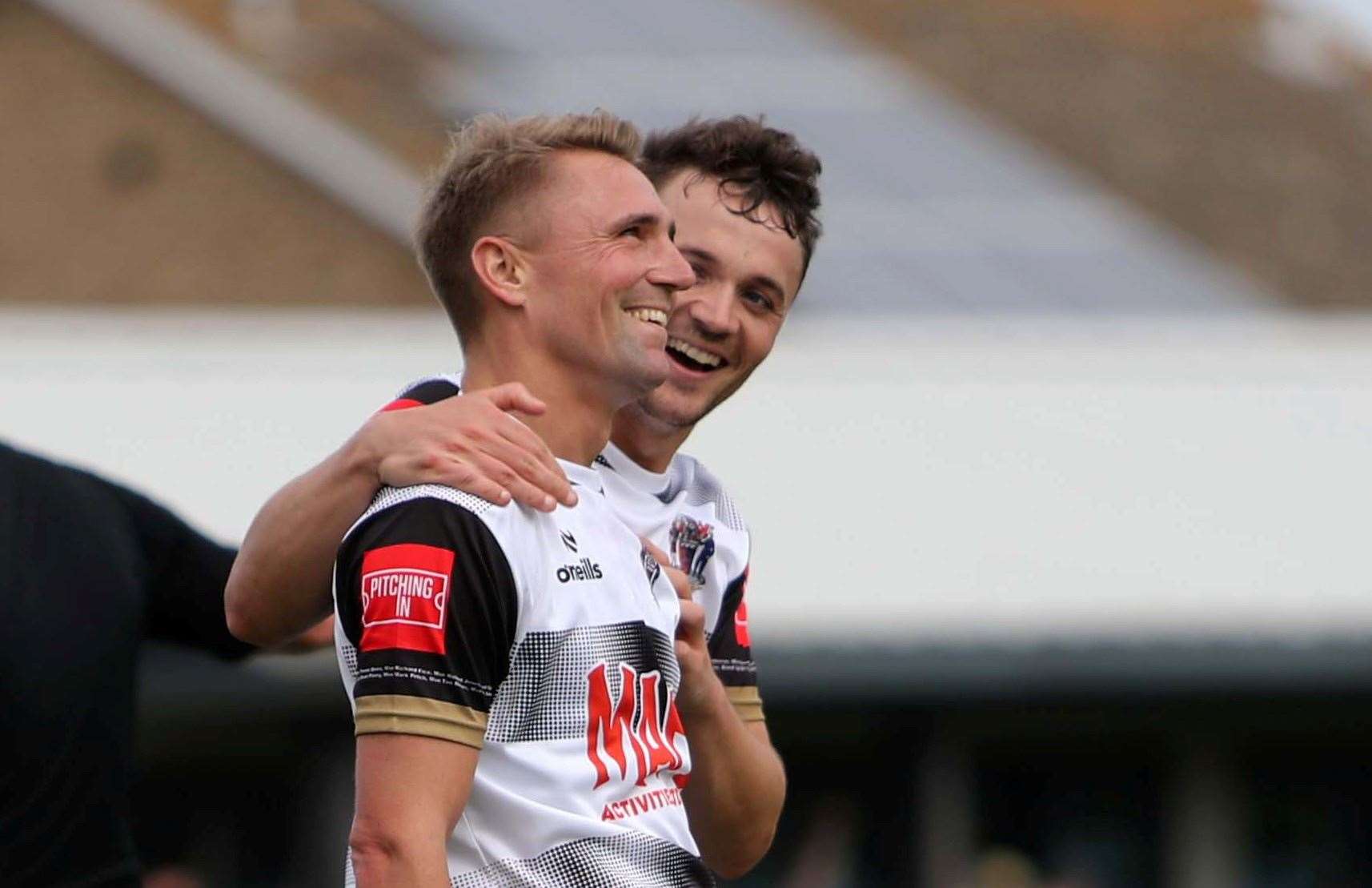 Tom Chapman celebrates with Deal team-mate Rory Smith, having put them 2-0 in front. Picture: Paul Willmott