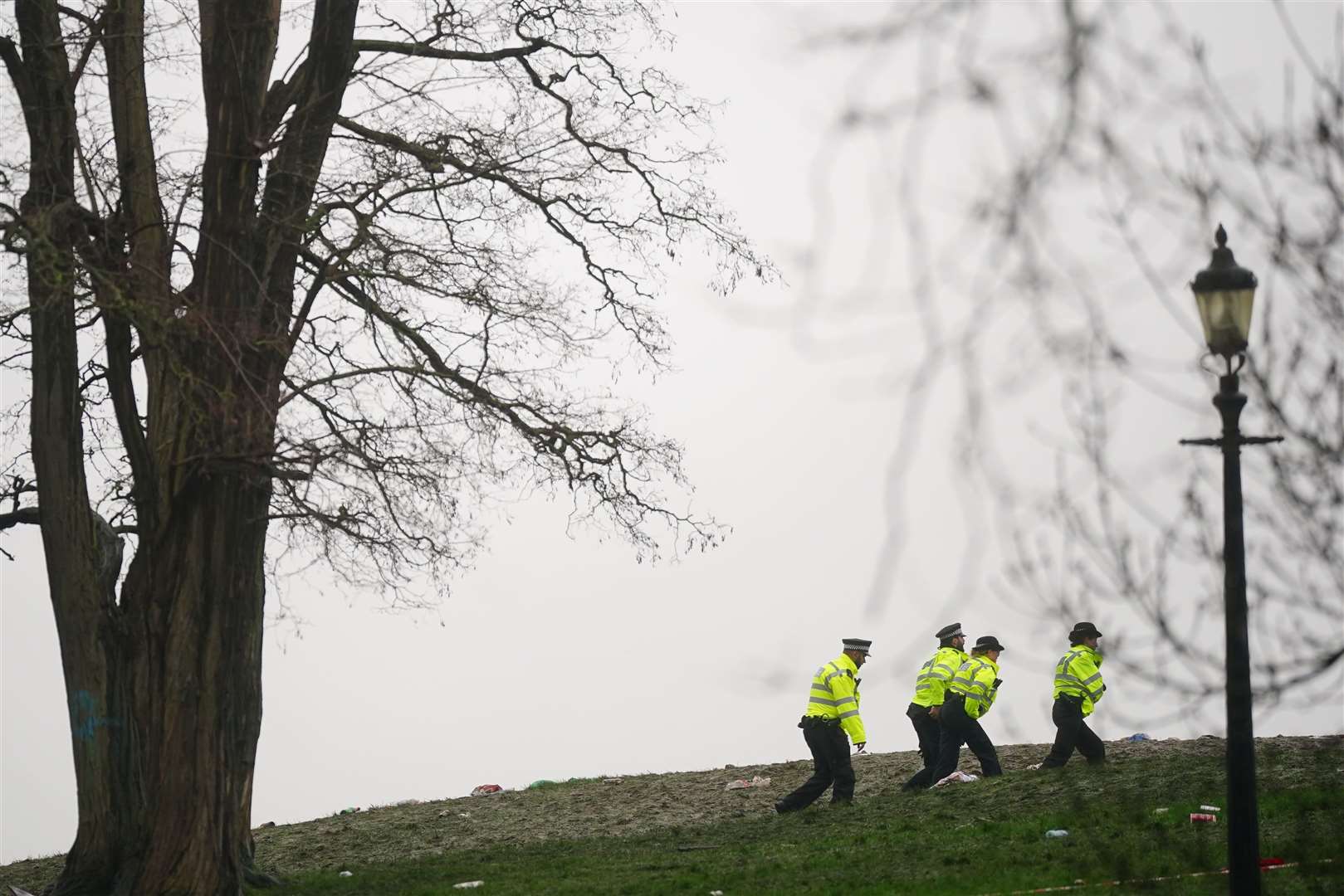 Police officers on Primrose Hill in Camden, north London, where 16-year-old Harry Pitman died after being stabbed just before midnight on New Year’s Eve (Victoria Jones/PA)