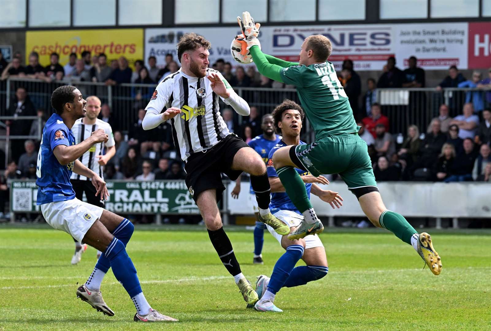 Dartford’s Harvey Bradbury challenges St Albans keeper Dylan Berry. Picture: Keith Gillard