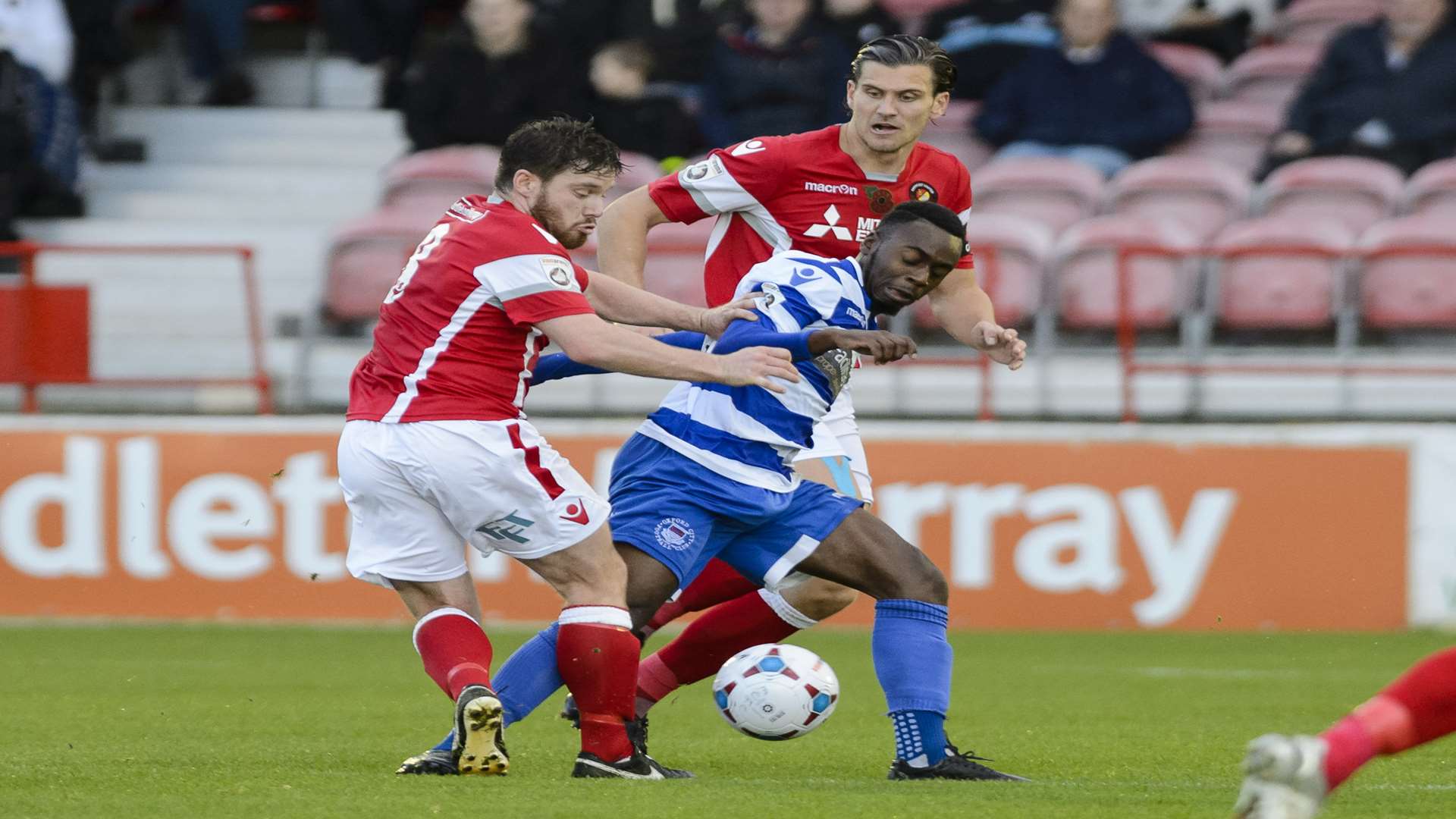 John Paul Kissock and Tom Bonner get stuck in against Oxford City Picture: Andy Payton