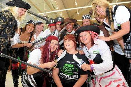 Asda staff get into the swing of things at the pirate day and sponsored head shaves in aid of the Oliver Smith Appeal