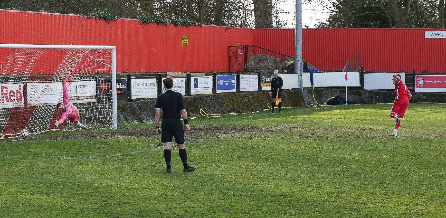 Josh Oliver sends his penalty past home goalkeeper Jordan Perrin to make it 2-0. Picture: Les Biggs