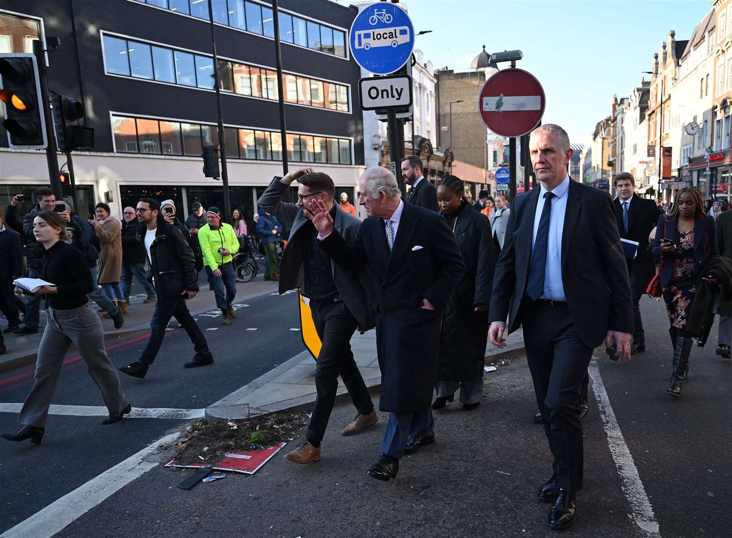 Charles waves to well-wishers as he arrives for an Advent Service at the Ethiopian Christian Fellowship Church, King’s Cross (PA)