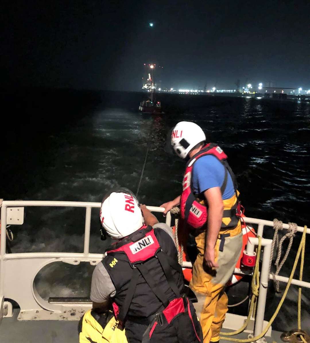 Sheerness lifeboat crew towing a stricken yacht to safety. Picture: RNLI